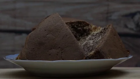Slices of cake rotation on the plate 動画素材 78864244