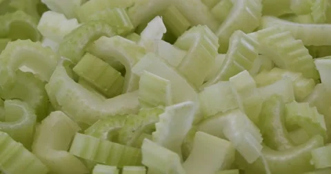 Slices of celery closeup rotating selective focus Stock Footage 167371908