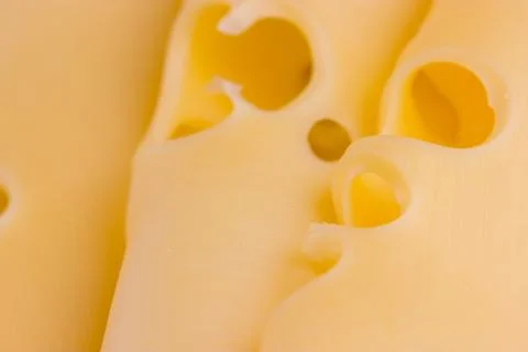 Slices of cheese close up Stock Photos