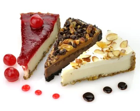 Slices of cheesecakes Stock Photos