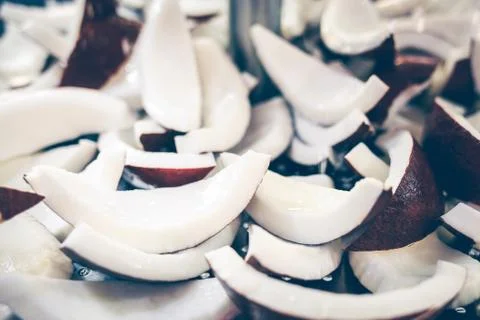 Slices of coconut. Stock Photos