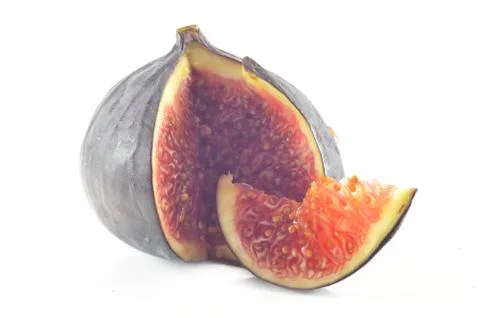 Slices of fig on a white background Stock Photos