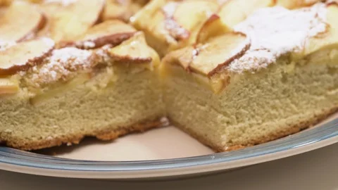 Slices of fresh baked Apple pie close up on a plate. Woman serving cake. Stock Footage 129200437