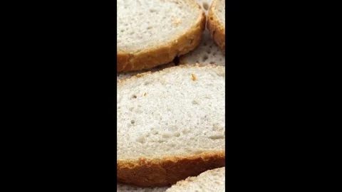 Slices of fresh baked bread Stock Footage 323297758