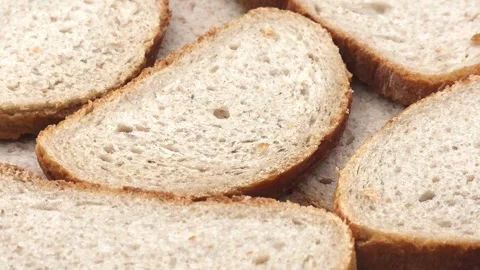Slices of fresh baked bread Stock Footage 323297965