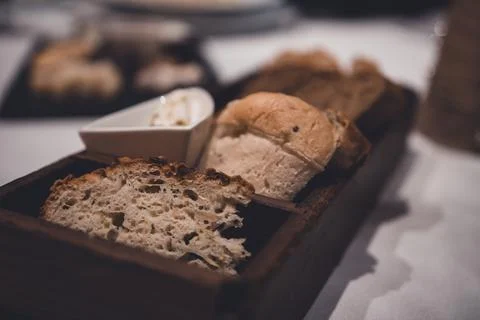 Slices of fresh bread in the restaurant Stock Photos