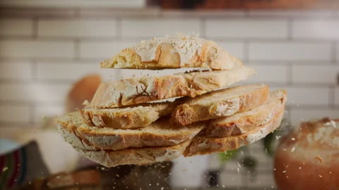 Slices of fresh bread in slow motion Stock Footage 153465637