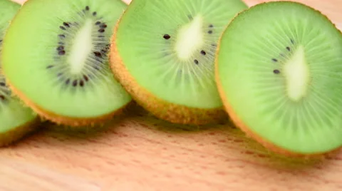 Slices of fresh kiwi fruit 스톡 동영상 61952140