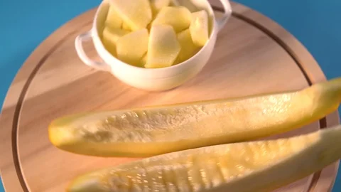 Slices of fresh melon rotating on a carousel Stock Footage 95290039