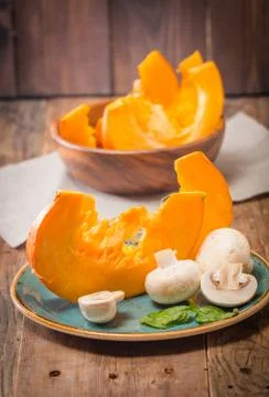Slices of fresh pumpkin Stock Photos