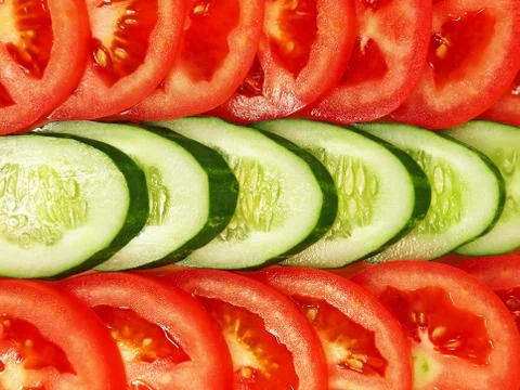 Slices of fresh vegetables.background. Stock Photos