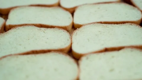 Slices of Fresh White Bread, Sliced White Bread, Isolated, Rotation, Close-up, F Stock Footage 145394774
