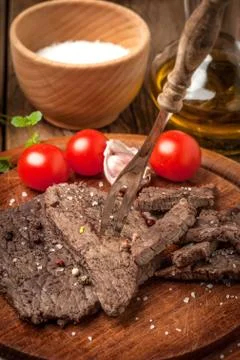 Slices of fried beef. Stock Photos
