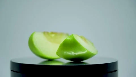 Slices granny smith apple turn around Video stock 296487267