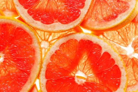 Slices of grapefruit Stock Photos