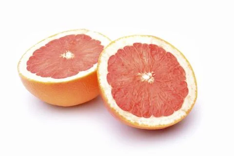 Slices of grapefruit on a white background. Fotos de archivo