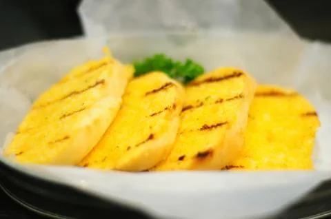 Slices of Grilled Garlic Bread Foto stock