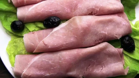 Slices of ham with a view that moves away Stock Footage 86524113
