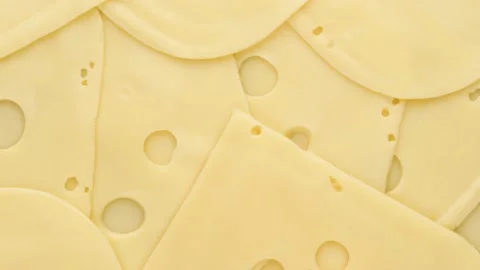 Slices of hard cheese, close up. Stock Footage 143500834