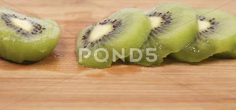Slices of kiwi Stock Photos