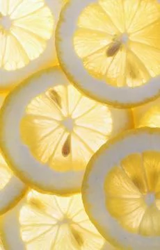 Slices of lemon background Stock Photos