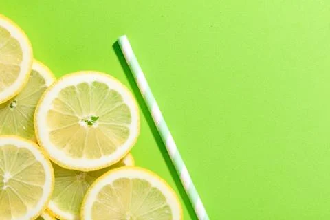 Slices of lemon with straw Stock Photos
