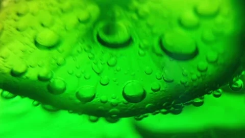 Slices of lime in cocktail Stock Footage 97715777