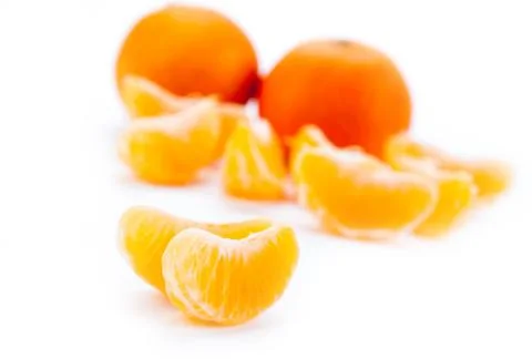Slices of mandarin Stock Photos