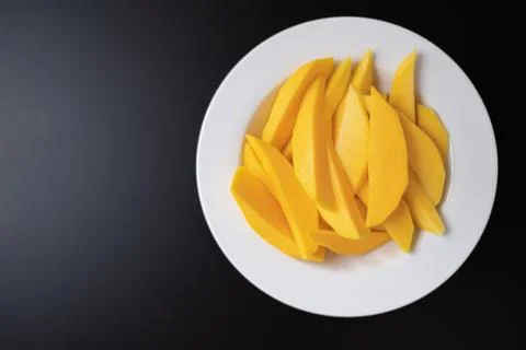 Slices of mango Stock Photos