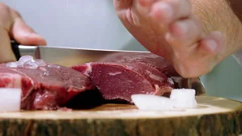 Slices meat on a cutting Board close-up Vidéo 221145765