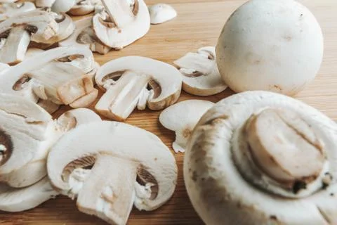 Slices of mushroom on a cutting board Stock Photos