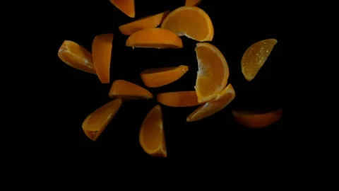 Slices of orange bouncing against to the camera Stock Footage 88491731