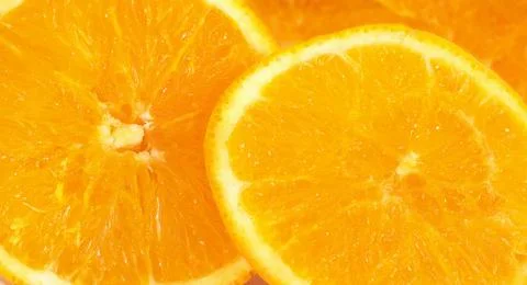 Slices of orange close up Stock Photos