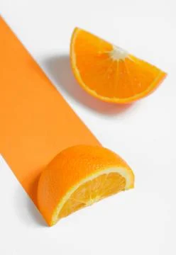 Slices of Orange on white background Free Stock Photos