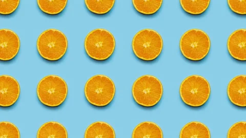 Slices of oranges animation background, seamless looping. 4K Stock Footage 130928356