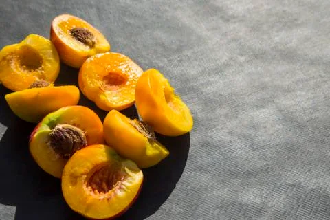Slices of peaches on marble Stock Photos