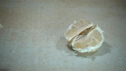 Slices of pomelo fall in slow motion. Stock Footage 121245457