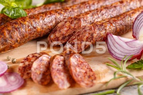 Slices of pork salami Stock Photos