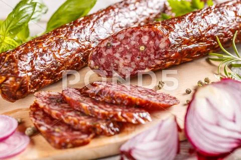 Slices of pork salami Stock Photos