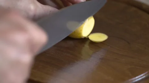Slices of potato Stock Footage 136571345