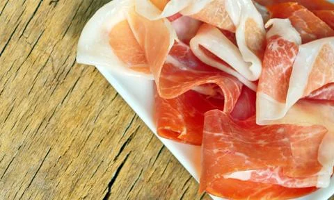 Slices of prosciutto Stock Photos