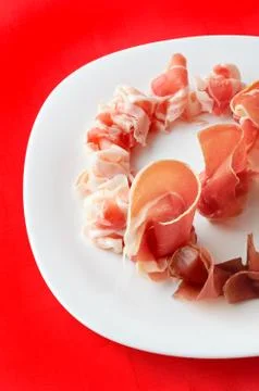Slices of prosciutto Stock Photos