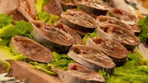 Slices of raw fish on stall at fish the market Stock Footage 103834809