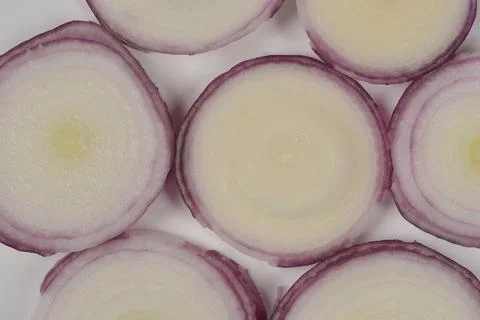Slices of Red Onion Background Stock Photos
