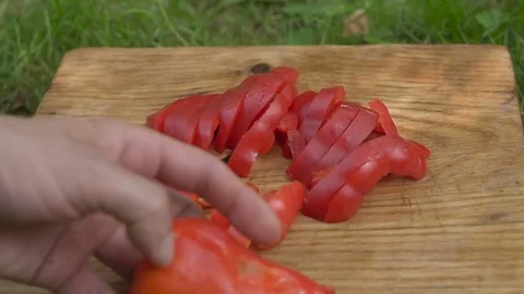 Slices red pepper on a cutting board Video stock 80238256