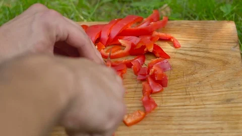 Slices red pepper on a cutting board close up 스톡 동영상 80238604