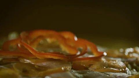 Slices of red peppers falling on pizza closeup slow motion Stock-Footage 71923481