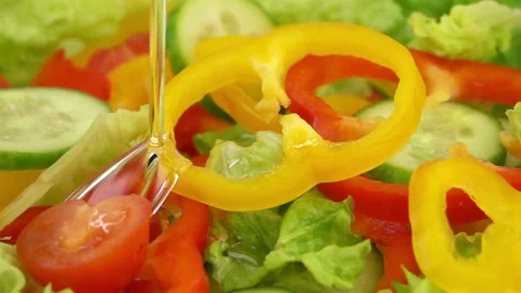 Slices of Ripe Vegetables are Falling on the Table Stock Footage 121002369