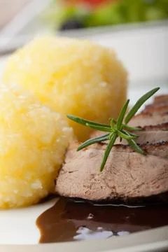 Slices of roasted duck with dumpling Stock Photos