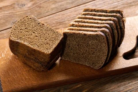 Slices of rye bread on the table Stock Photos